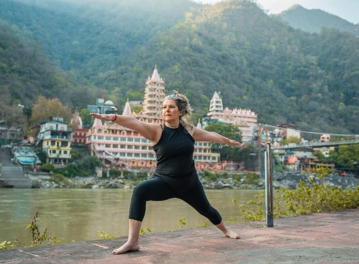 Woman doing yoga in Rishikesh