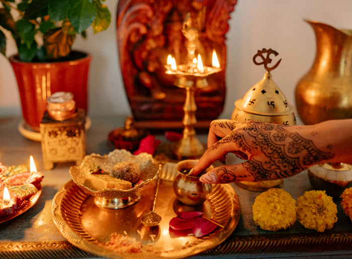 Devotees engaging in a pooja