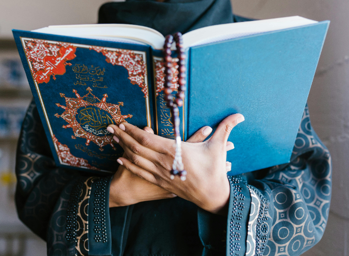 A woman reading the Qoran